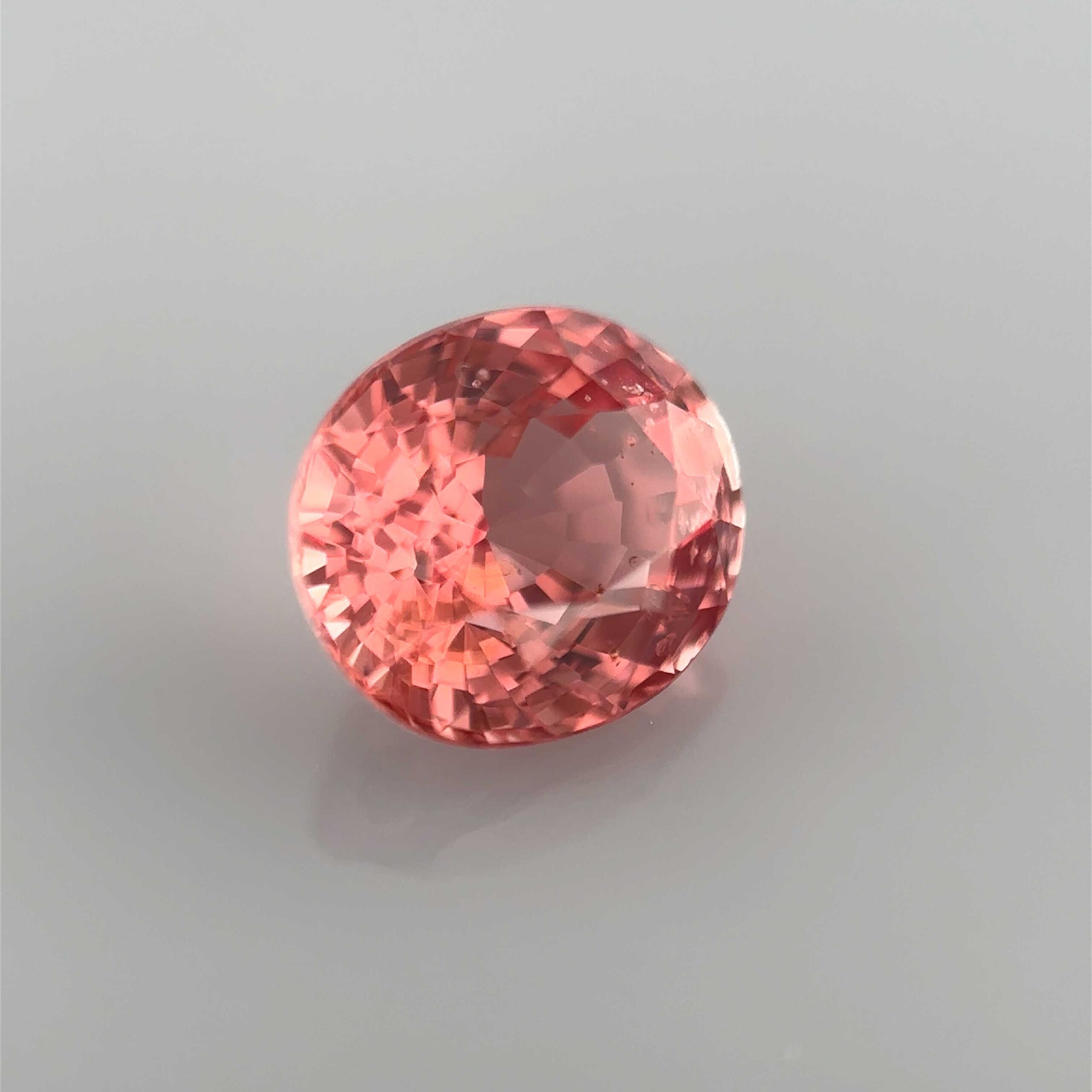 peachy natural spinel cushion oval